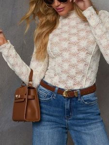 LA Angels Bluzka w kolorze kremowym rozmiar: L. Brązowe bluzki LA Angels, l, bez wzorów, z koronki, bez kołnierzyka, bez ramiączek. Za 156,61 zł.