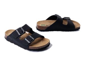 DR. BRINKMANN 600133-01 schwarz, klapki damskie. Czarne klapki Dr. Brinkmann, bez wzorów, ze skóry, bez obcasa. Za 264,90 zł.