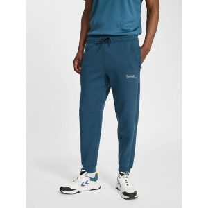 Spodnie dresowe z polaru Hummel Tech Regular. Niebieskie spodnie dresowe Hummel, bez wzorów, z dresówki, sportowe. Za 304,00 zł.