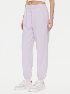 Calvin Klein Jeans Spodnie dresowe Monologo LV047B235G Fioletowy Regular Fit. Fioletowe spodnie dresowe Calvin Klein Jeans, xl, bez wzorów, z bawełny. Za 239,99 zł.