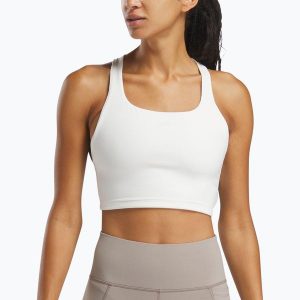 Koszulka Reebok Lux Tank. Białe bluzki REEBOK FITNESS, bez wzorów, sportowe, bez kołnierzyka, bez ramiączek. Za 209,99 zł.