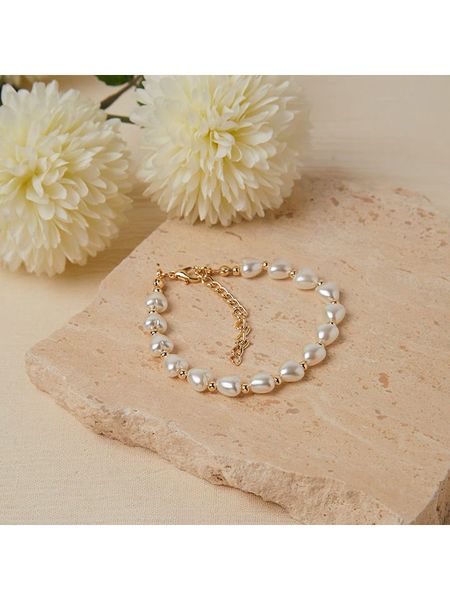 Heliophilia Pozłacana bransoletka rozmiar: onesize. Żółte bransoletki Heliophilia, z perłą, metalowe. Za 21,99 zł.