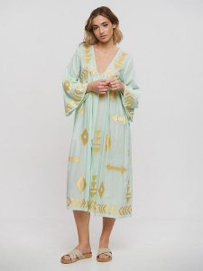 BLE Sukienka w kolorze jasnozielono-złotym rozmiar: onesize. Zielone sukienki BLE, bez wzorów, z bawełny, bez kołnierzyka, bez ramiączek, maxi. Za 123,45 zł.