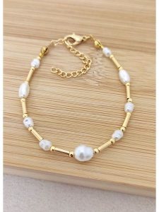 La Asena Pozłacana bransoletka rozmiar: onesize. Białe bransoletki La Asena, z perłą, pozłacane. Za 34,99 zł.