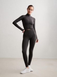 Damskie legginsy dłuższe, wysoki stan, invisible scrunch Shape Seamless szare. Szare legginsy AIM'N, bez wzorów, z dzianiny, z podwyższonym stanem, długie. Za 300,00 zł.