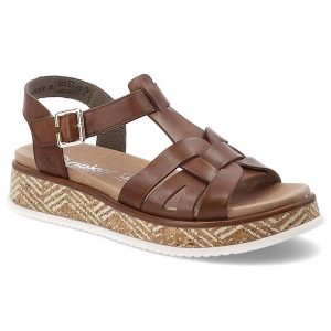 Brązowe Sandały Rieker Modne Obuwie Damskie. Brązowe sandały Rieker, bez wzorów, bez obcasa, na koturnie, bez zapięcia. Za 399,00 zł.