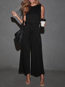 Milan Kiss Kombinezon w kolorze czarnym rozmiar: XL. Czarne kombinezony Milan Kiss, xl, bez wzorów, bez kołnierzyka, bez ramiączek. Za 173,99 zł.