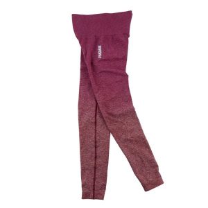 Second life - Legginsy damskie Seamless Gymshark różowe - Stan bardzo dobry. Czerwone legginsy Gymshark, bez wzorów, z materiału. Za 106,46 zł.