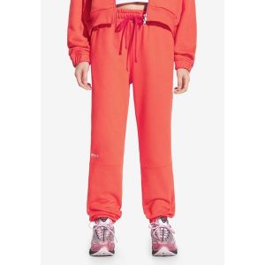 Spodnie dresowe damskie Prosto Cut. Czerwone spodnie dresowe Prosto, bez wzorów, z dresówki. W wyprzedaży za 233,99 zł.