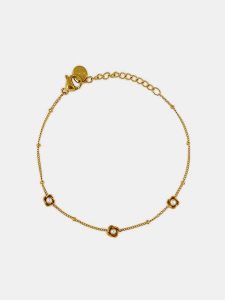 MOODE Bransoletka "Renee" z elementami ozdobnymi rozmiar: onesize. Białe bransoletki MOODE, z perłą, ze stali. Za 39,99 zł.