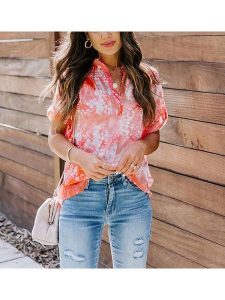 LA Angels Bluzka w kolorze czerwono-pomarańczowo-białym rozmiar: M. Białe bluzki LA Angels, m, bez wzorów, bez kołnierzyka, bez ramiączek. Za 145,26 zł.