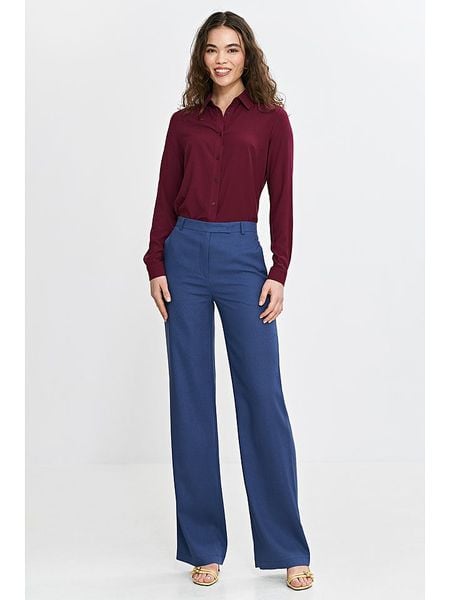 Nife Spodnie w kolorze niebieskim rozmiar: 40. Niebieskie spodnie z wysokim stanem Nife, bez wzorów, z materiału, z podwyższonym stanem. Za 148,26 zł.