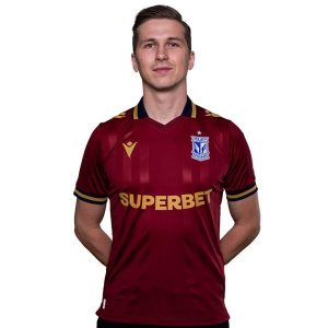 Koszulka piłkarska Macron Lech Poznań 24/25. Czerwone bluzki MACRON, m, bez wzorów, sportowe, bez kołnierzyka, bez ramiączek. W wyprzedaży za 279,99 zł.
