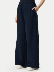 Tommy Jeans Spodnie dresowe Script DW0DW23398 Granatowy Wide Leg. Niebieskie spodnie dresowe Tommy Jeans, l, bez wzorów, z bawełny. Za 449,99 zł.