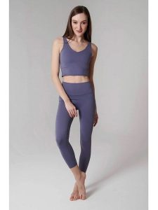 Onamaste Legginsy sportowe "Mantra" w kolorze granatowym rozmiar: S/M. Niebieskie legginsy Onamaste, m, bez wzorów, z podwyższonym stanem, outdoorowe. Za 114,71 zł.