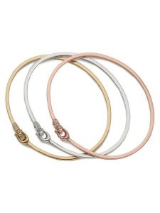 Coach Zestaw bransoletek 37335756TRI973 Złoty. Żółte bransoletki Coach, metalowe. Za 369,99 zł.