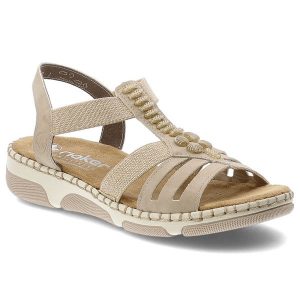 Sandały damskie Rieker, cholewka ze skóry naturalnej i materiału tekstylnego paski dla lepszego dopasowania, beżowe, 66201-62. Brązowe sandały Rieker, bez wzorów, ze skóry, bez obcasa, na koturnie, bez zapięcia. Za 319,00 zł.