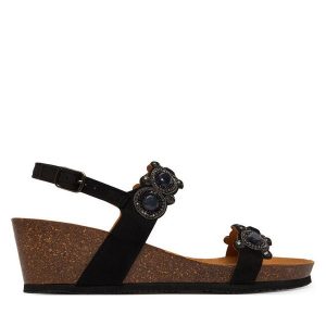 Sandały Scholl. Czarne sandały Scholl, bez wzorów, bez obcasa, na koturnie, bez zapięcia. Za 439,99 zł.