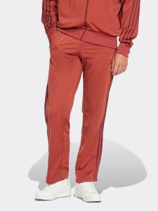 Adidas Spodnie dresowe w kolorze czerwonym rozmiar: XXL. Czerwone spodnie dresowe ADIDAS, xxl, bez wzorów, z dresówki. Za 178,79 zł.