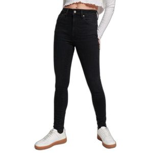 Damskie jeansy skinny z wysoką talią Superdry Vintage. Czarne spodnie dresowe Superdry, bez wzorów, z jeansu, z podwyższonym stanem, długie. Za 371,65 zł.