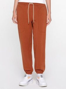 Puma Spodnie dresowe "Infuse" w kolorze jasnobrązowym rozmiar: M. Brązowe spodnie dresowe Puma, m, bez wzorów, z dresówki. Za 140,20 zł.