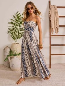 Milan Kiss Sukienka w kolorze niebiesko-kremowym rozmiar: S. Brązowe sukienki Milan Kiss, s, bez wzorów, z wiskozy, bez kołnierzyka, bez ramiączek, maxi. Za 208,99 zł.