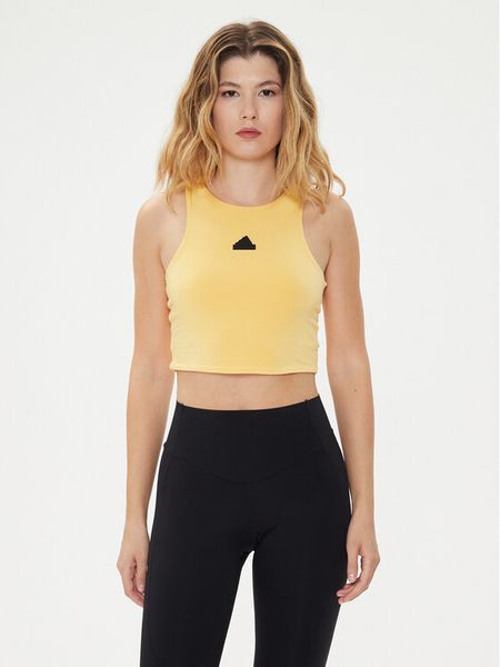 Adidas Top City Escape IS0668 Żółty Slim Fit. Żółte topy ADIDAS, m, bez wzorów, bez kołnierzyka, bez ramiączek. Za 89,99 zł.
