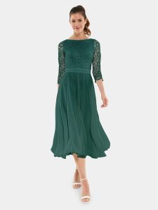 Swing Sukienka koktajlowa 77761710 Zielony Regular Fit. Zielone kombinezony Swing, bez wzorów, z syntetyku, wizytowe, bez kołnierzyka, bez ramiączek. Za 609,99 zł.