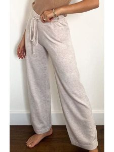 Zibi London Spodnie w kolorze beżowym rozmiar: M/L. Brązowe spodnie dresowe Zibi London, l, bez wzorów, z dresówki. Za 61,60 zł.