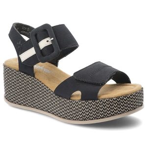 Sandały damskie Rieker, cholewka ze skóry ekologicznej zapiane na rzep fason na koturnie, granatowe, 69450-14. Niebieskie sandały Rieker, bez wzorów, ze skóry ekologicznej, bez obcasa, na koturnie, bez zapięcia. Za 349,00 zł.