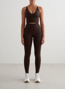 Damskie legginsy bezszwowe, wysoki stan, squat proof petite Shape czekoladowy. Brązowe legginsy AIM'N, bez wzorów, z elastanu, z podwyższonym stanem. Za 296,00 zł.
