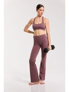 Onamaste Legginsy sportowe "Flair Stella" w kolorze fiołkowym rozmiar: L/XL. Różowe legginsy Onamaste, bez wzorów, z materiału, z podwyższonym stanem. Za 130,99 zł.