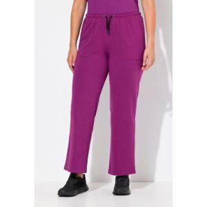 Damskie Spodnie dresowe proste nogawki elastyczny pas. Czerwone rajstopy i pończochy Ulla Popken, plus size, bez wzorów, z bawełny. Za 195,99 zł.