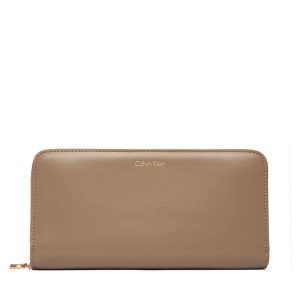 Portfel Calvin Klein. Brązowe portfele Calvin Klein, bez wzorów. Za 329,99 zł.