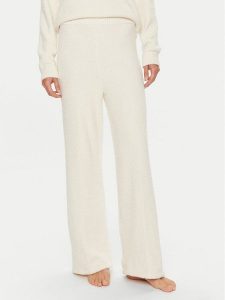 Calvin Klein Spodnie piżamowe 000QS7338E Écru Relaxed Fit. Piżamy Calvin Klein, bez wzorów, z syntetyku, bez ramiączek. Za 149,99 zł.