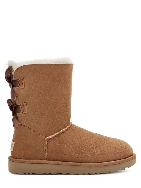 UGG Skórzane kozaki zimowe "Baily Bow II" w kolorze brązowym rozmiar: 36. Brązowe kozaki Ugg, na zimę, bez wzorów, z wełny, z okrągłym noskiem, bez obcasa, bez zapięcia. Za 632,42 zł.