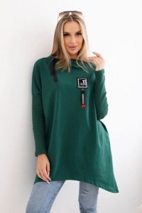 Bluza oversize z asymetrycznymi bokami ciemno zielona. Zielone bluzy KESI, l, bez wzorów, z bawełny, bez kaptura. Za 209,11 zł.