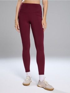 Legginsy sportowe - bordowy. Czerwone legginsy Sinsay, bez wzorów. Za 39,99 zł.