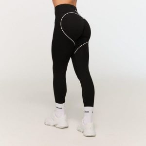 Legginsy damskie fitness z wysokim stanem czarne Varsity. Czarne legginsy GYMBEAM, bez wzorów, z materiału, z podwyższonym stanem, długie. Za 113,90 zł.