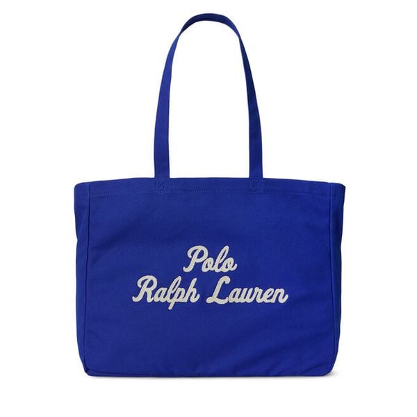 Torebka Polo Ralph Lauren. Niebieskie shopper bag Polo Ralph Lauren, bez wzorów, bez dodatków. Za 479,99 zł.