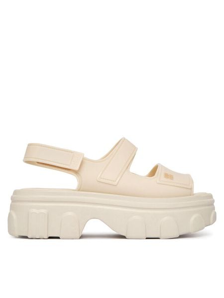 Melissa Sandały Melissa Ella Move Ad 36150 Beżowy. Brązowe sandały Melissa, bez wzorów, z tworzywa sztucznego, bez obcasa, na koturnie, bez zapięcia. Za 578,99 zł.