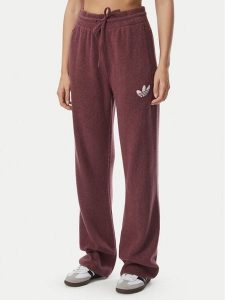 Adidas Spodnie dresowe Essentials IA4436 Bordowy Loose Fit. Czerwone spodnie dresowe ADIDAS, xs, bez wzorów, z dresówki. Za 298,99 zł.