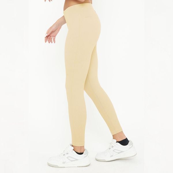 Legginsy treningowe BURNER damskie. Szare legginsy LEGEA, bez wzorów, z elastanu, z podwyższonym stanem, długie. Za 89,90 zł.