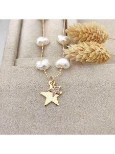 Nakkash Pozłacana bransoletka z perłami syntetycznymi rozmiar: onesize. Żółte bransoletki Nakkash, z perłą, pozłacane. Za 43,99 zł.