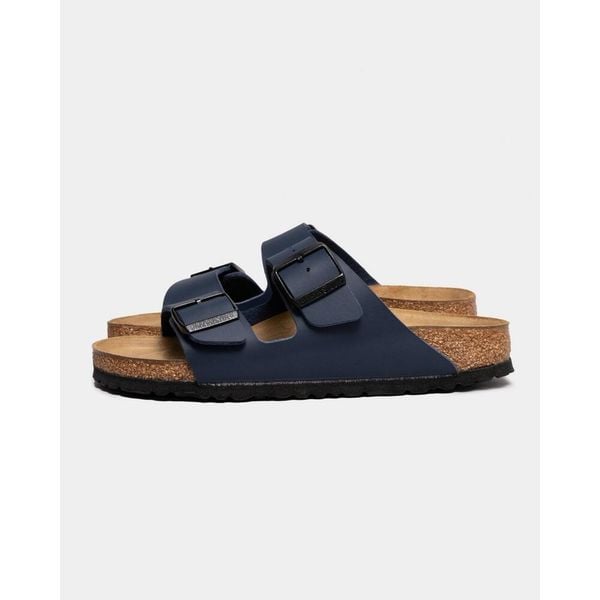 Klapki damskie Birkenstock Arizona. Niebieskie klapki Birkenstock, bez wzorów, z materiału, bez obcasa. Za 392,05 zł.