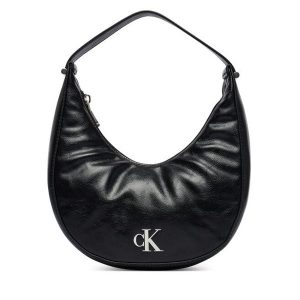 Torebka Calvin Klein. Czarne torebki klasyczne Calvin Klein, bez wzorów, bez dodatków. Za 409,99 zł.