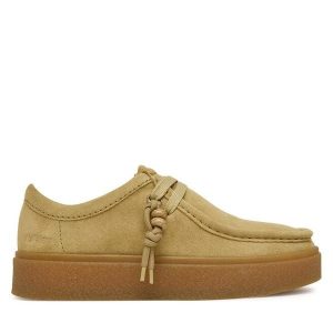Półbuty Clarks. Brązowe półbuty Clarks, bez wzorów, bez obcasa, na płaskiej podeszwie, bez zapięcia. Za 479,99 zł.