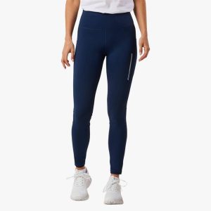 Długie legginsy treningowe damskie Swedemount Core Pocket Tights szybkoschnące. Niebieskie legginsy SWEDEMOUNT, bez wzorów, z tkaniny, długie. W wyprzedaży za 125,00 zł.