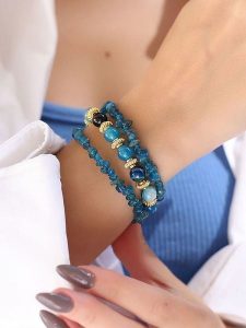 Pierres delicates Pozłacana bransoletka z agatami i azurytami rozmiar: onesize. Niebieskie bransoletki Pierres delicates, z agatem, pozłacane. Za 52,99 zł.