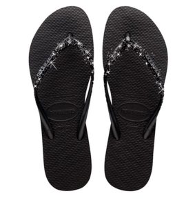 Klapki Havaianas Model Slim Glitter Ii Kolor Czarny. Czarne klapki Havaianas, bez wzorów, z gumy, bez obcasa. Za 158,90 zł.